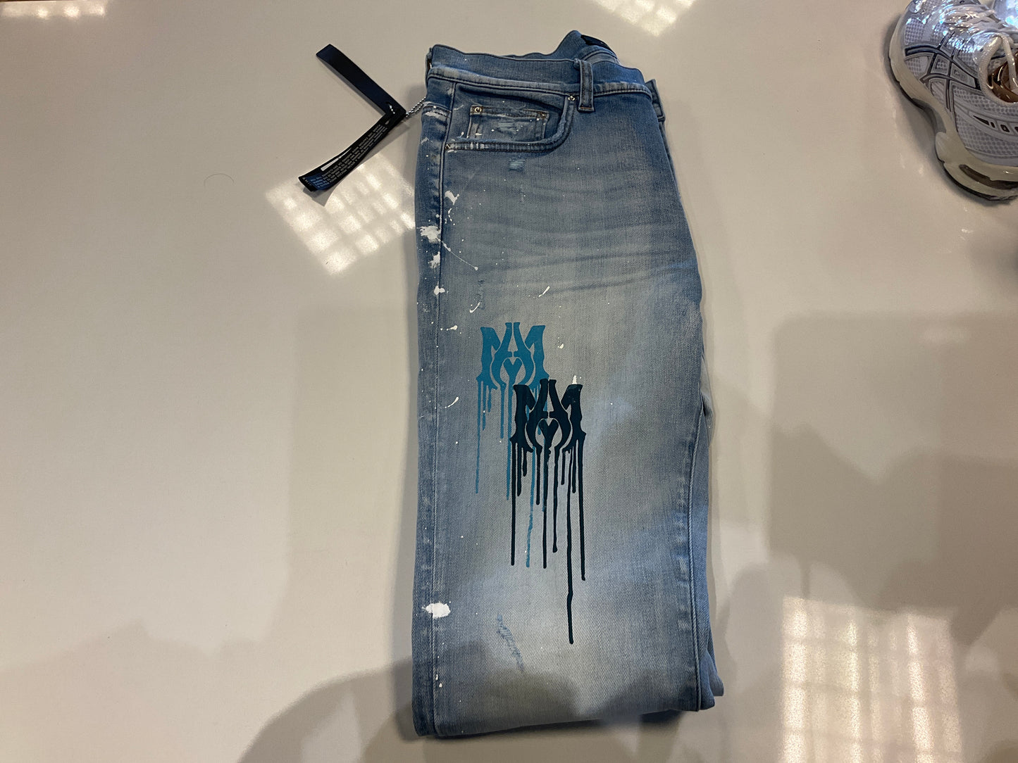 Amiri Jean White Paint Splatter Core Logo
