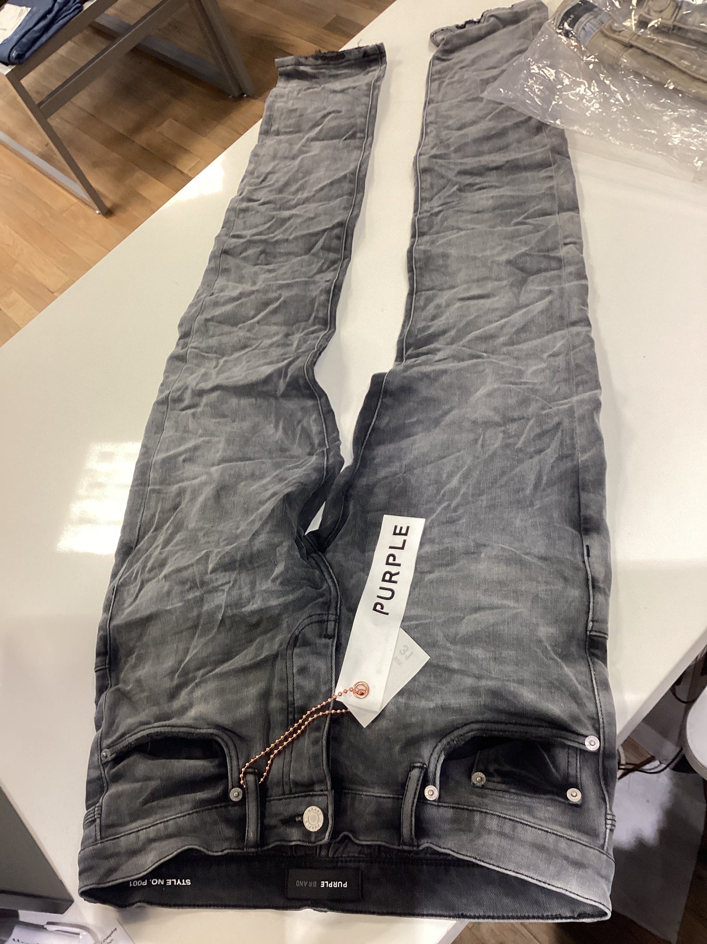 Purple denim tear jeans