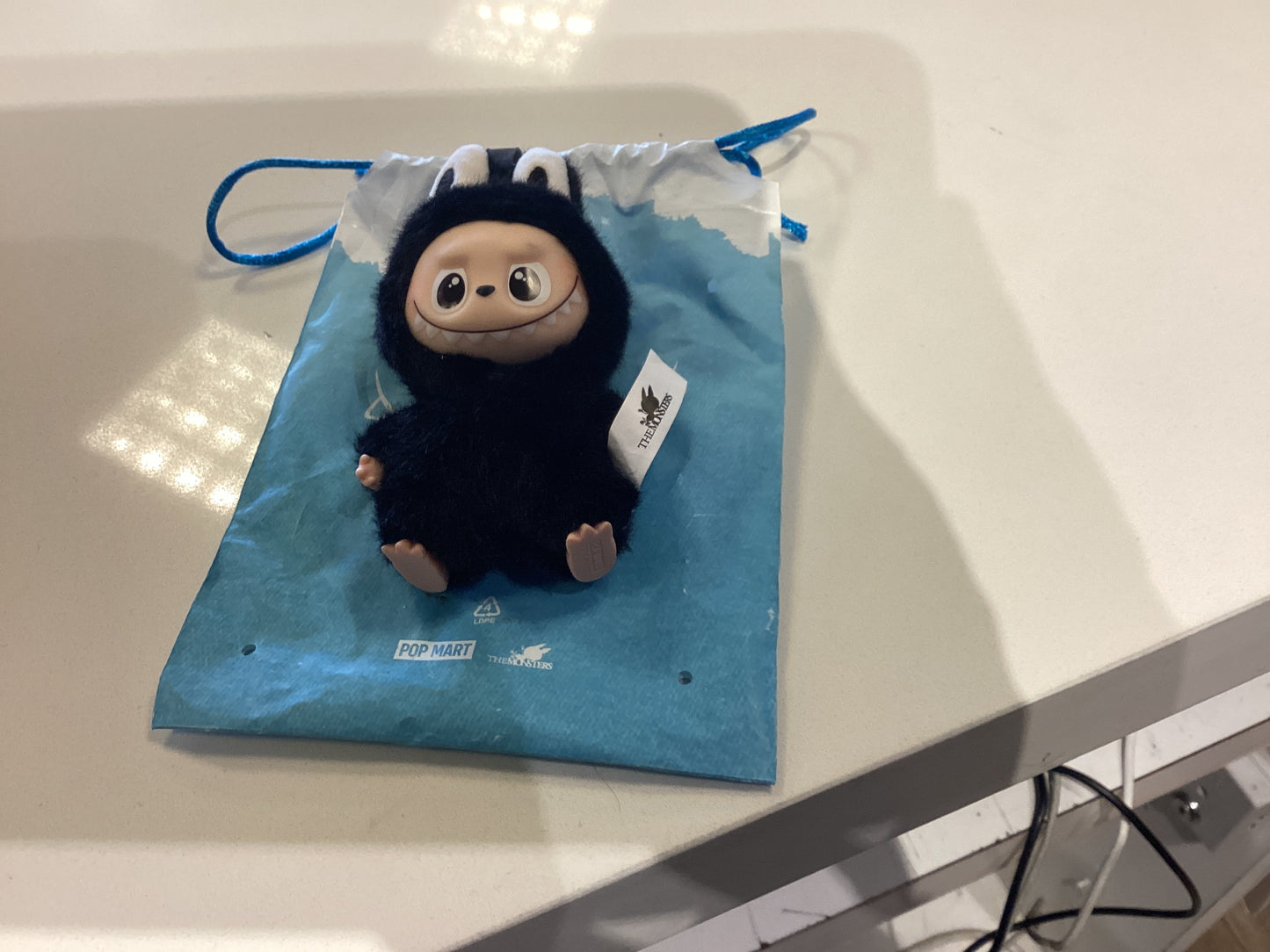Mini Labubu doll