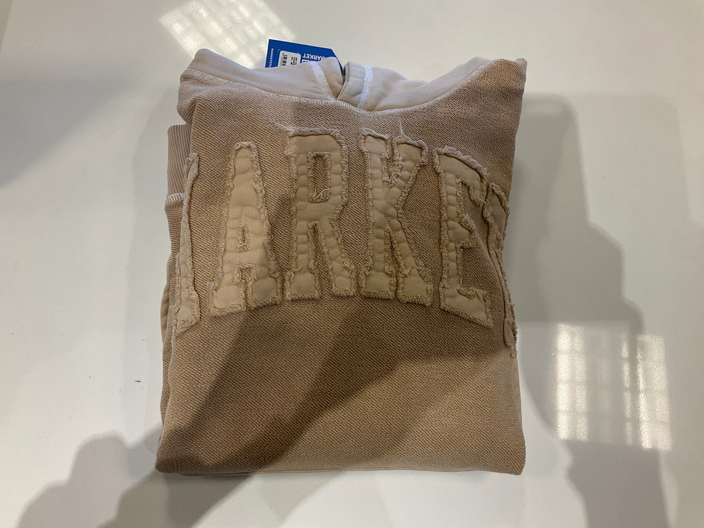 Market Hoodie Man Oat Milk